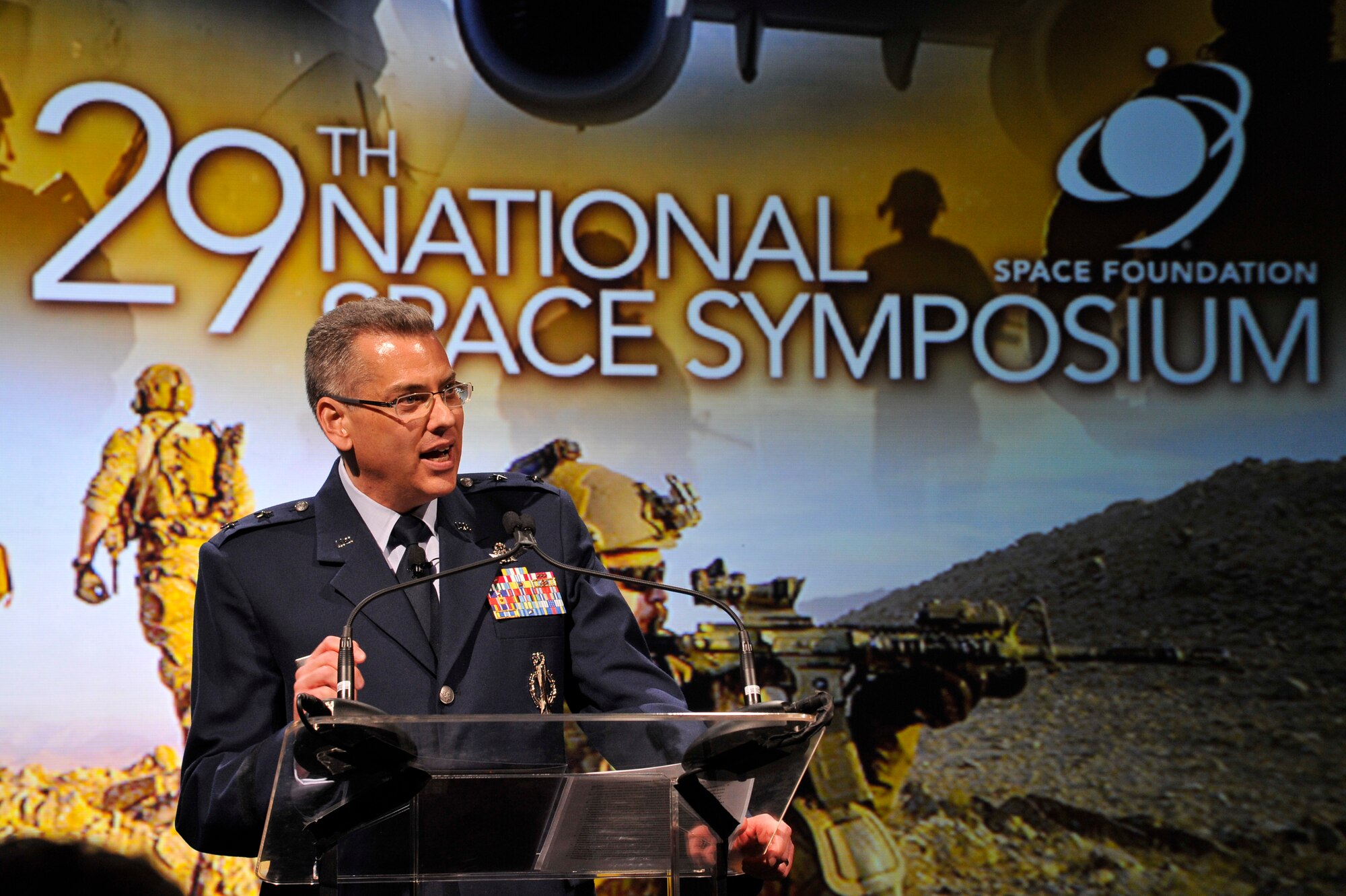 Maj. Gen. Jack Weinstein discusses General William Shelton's new role as Commander, Air Force Forces for space and cyber, how Air Force Space Command is transforming to meet that responsibility, and what this role means to the warfighter.  General Weinstein, Director of Air, Space and Cyberspace Operations, Air Force Space Command, spoke during the Space Warfighters Luncheon at the National Space Symposium April 9, Colorado Springs, Colo. General Shelton is the Commander of Air Force Space Command.  (U.S. Air Force photo/Staff Sgt. Christopher Boitz)    