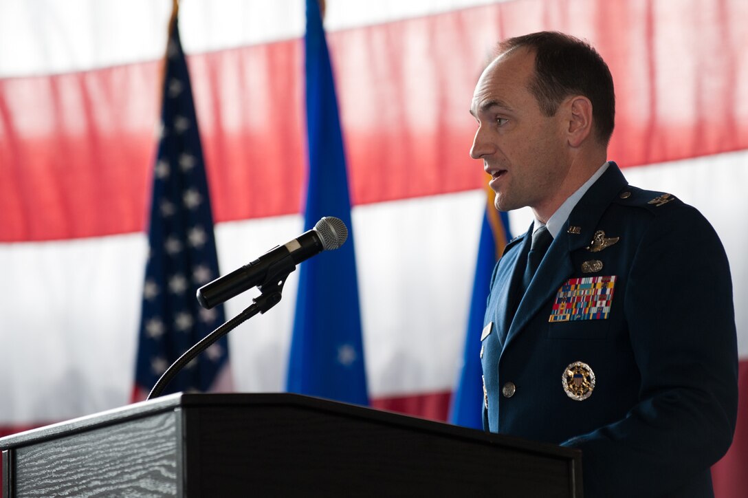 Col. Kevin Kennedy, 28th Bomb Wing commander, speaks at his change of command ceremony in the Pride Hangar at Ellsworth Air Force Base, S.D., April 5, 2013. Kennedy served previously at Ellsworth on three separate occasions, and now returns as commander of the 28th Bomb Wing. (U.S. Air Force photo by Airman 1st Class Kate Thornton-Maurer/Released)
