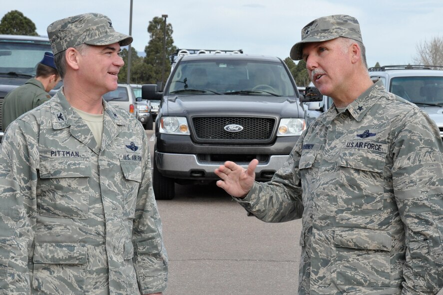 PETERSON AIR FORCE BASE, Colo. Col. Jay Pittman, left, 302nd Airlift Wing commander, welcomes Brig. Gen. Jay Flournoy, Air Reserve Personnel Center commander, Mar. 29 here. Flournoy, who took command of ARPC earlier this year, was briefed on several on-going 302nd AW Total Force Initiative projects as well as the wing’s overall mission, its Modular Airborne Fire Fighting System special mission and the 302nd AW’s Development and Training Flight program. (U.S. Air Force photo/Master Sgt. Daniel Butterfield) 