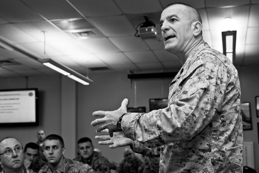 U.S. Marine Sgt. Maj. Bryan Battaglia, the senior non-commissioned officer of the U.S. Armed Forces, speaks to Illinois soldiers and airmen at the 182nd Airlift Wing in Peoria, Ill., April 6, 2013.  Battaglia currently serves as the Senior Enlisted Advisor to the Chairman of the Joint Chiefs of Staff.  He visited the installation to discuss the state of the enlisted corps with Illinois soldiers and airmen in a town hall-style meeting.  (U.S. Air Force photo by Staff Sgt. Lealan Buehrer//Released)