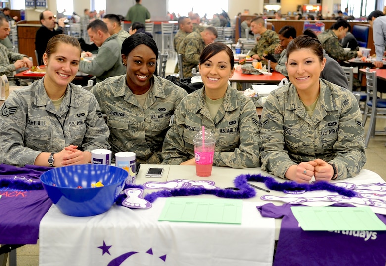 Volunteers from the Osan Junior Enlisted Council work the American Cancer Society Relay for Life booth at the Base Exchange at Osan Air Base, Republic of Korea in March 2013. OJEC is co-sponsoring Relay for Life on May 4-5, helping to celebrate, fight back and raise awareness of the fight against cancer.  (U.S. Air Force photo/Airman 1st Class Alexis Siekert) 