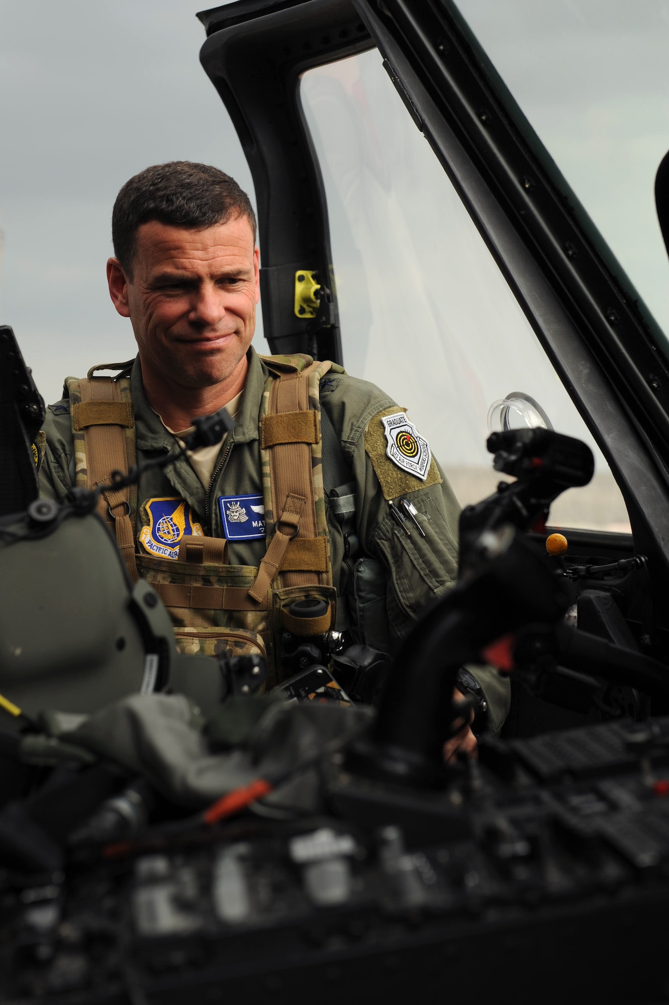 U.S. Air Force Brig. Gen. Matt Molloy, 18th Wing commander, prepares to fly an HH-60G Pave Hawk helicopter for the last time on Kadena Air Base, Japan, April 9, 2013. Molloy has served two years as the base commander and will hand off the guidon in May. (U.S. Air Force photo by Airman 1st Class Hailey R. Davis)