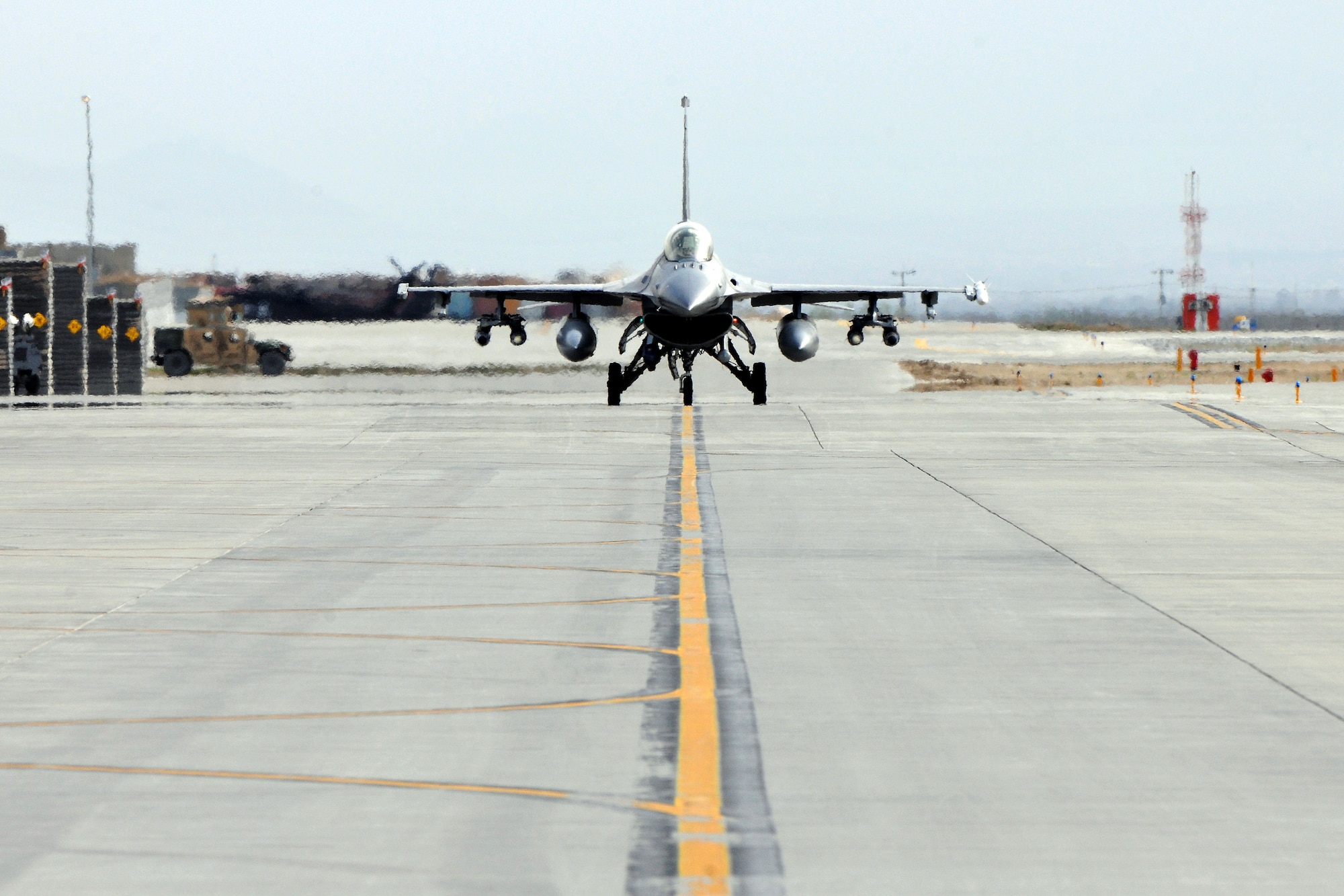 An F-16 Fighting Falcon deployed from Shaw Air Force Base, S.C., taxis to the flightline on Bagram Airfield, Afghanistan Apr. 6, 2013. The F-16 is a compact, multi-role fighter aircraft that is highly maneuverable in air-to-air combat and air-to-surface attacks. (U.S. Air Force photo/Senior Airman Chris Willis)