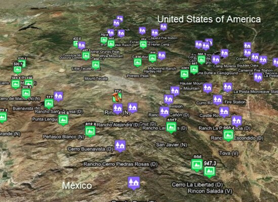 This image shows mountains (green squares) and ranches (purple squares) extracted in a single query from the U.S. Geological Survey data in the United States and the National Geospatial-Intelligence Agency data in Mexico.
