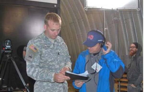 ERDC-GSL’s Capt. Ben Murray reviewed questions from Director Daniel Miller of U Direct NYC video production company prior to shooting a Channel One vignette on Army engineering careers.  The Army is a major partner for the news channel, which broadcasts nationwide to high school students.