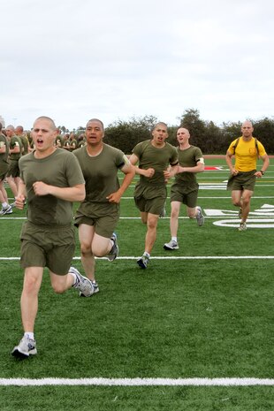 Recruits of Company G, 2nd Recruit Training Battalion, run to their first station during the Circuit Course aboard Marine Corps Recruit Depot San Diego, April 2. The Circuit Course helps recruits gauge their fitness level and identify strengths and weaknesses.