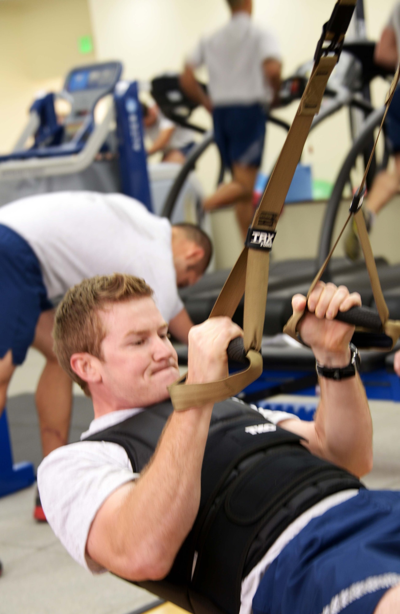 Staff Sgt. Patrick Harrington, 320th Special Tactics Squadron, works out in the Human Performance Training Center, during squadron physical training March 22 at Kadena Air Base.  The HPTC houses the human performance program, which focuses on not only strengthening the battlefield Airman physically, but also rehabilitating the individual ensuring the Air Force’s human weapons system is performing to its maximum potential for as long as possible. (U.S. Air Force photo by Tech. Sgt. Kristine Dreyer)