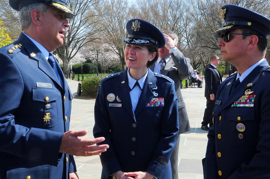 Air Force District of Washington Commander Maj. Gen. Sharon K. G. Dunbar speaks with Columbian Air Force Commander Gen. Tito Saul Pinilla Pinilla following a wreath laying ceremony at the Tomb of the Unknown Soldier, April 9, 2013, in Arlington, Va. The ceremony honored fallen members of the Colombian Air Force for their sacrifices during times of war. (U.S. Air Force photo by Senior Airman Steele C. G. Britton)