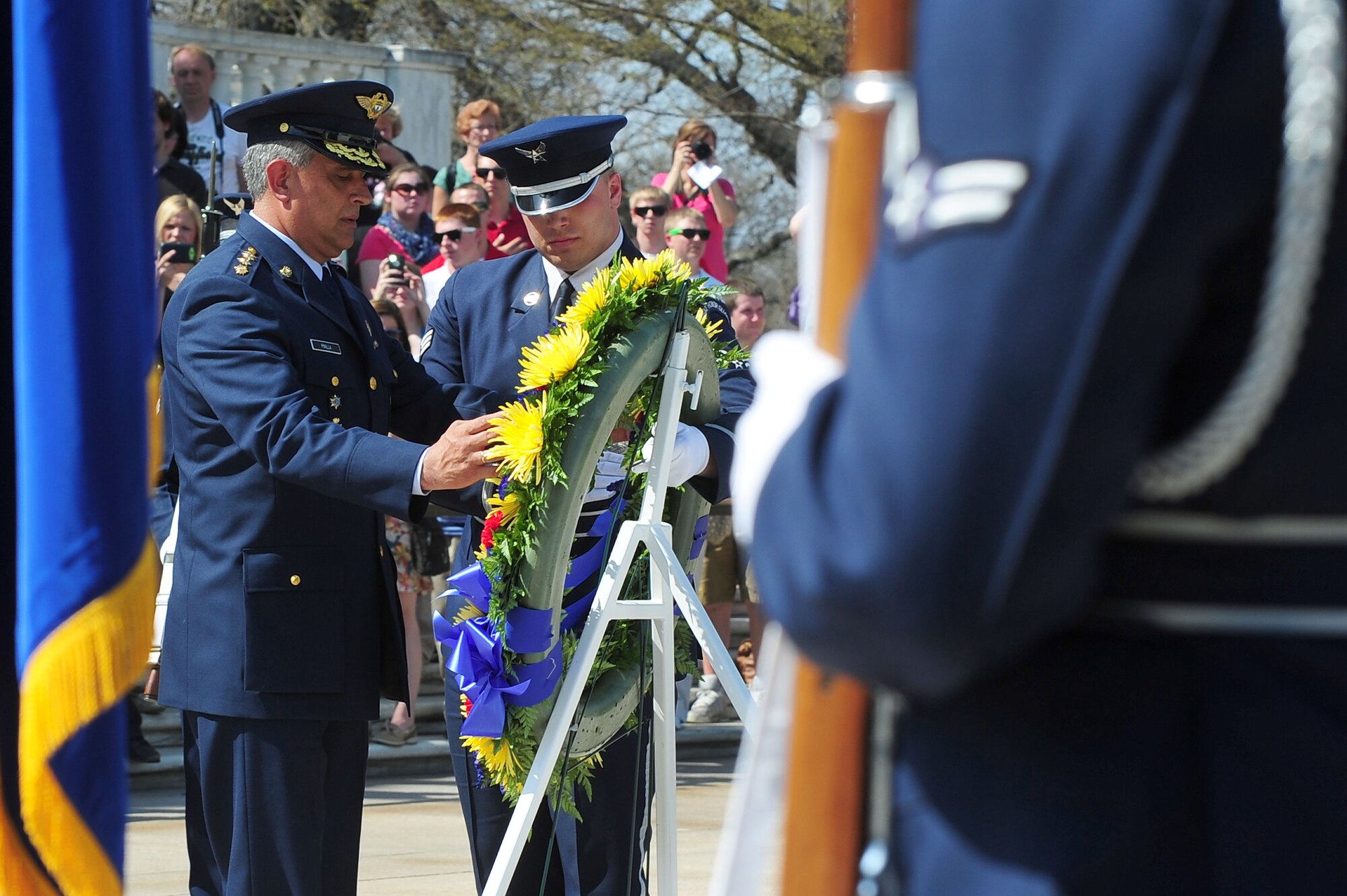 Columbian Air Force Commander Gen. Tito Saul Pinilla Pinilla places a wreath honoring members of the Columbian Air Force who lost their lives during a time of war at the Tomb of the Unknown Soldier, April 9, 2013, in Arlington, Va. The U.S. Air Force Honor Guard and Band performed during the ceremony with precise ceremonial drill and patriotic music. (U.S. Air Force photo by Senior Airman Steele C. G. Britton)