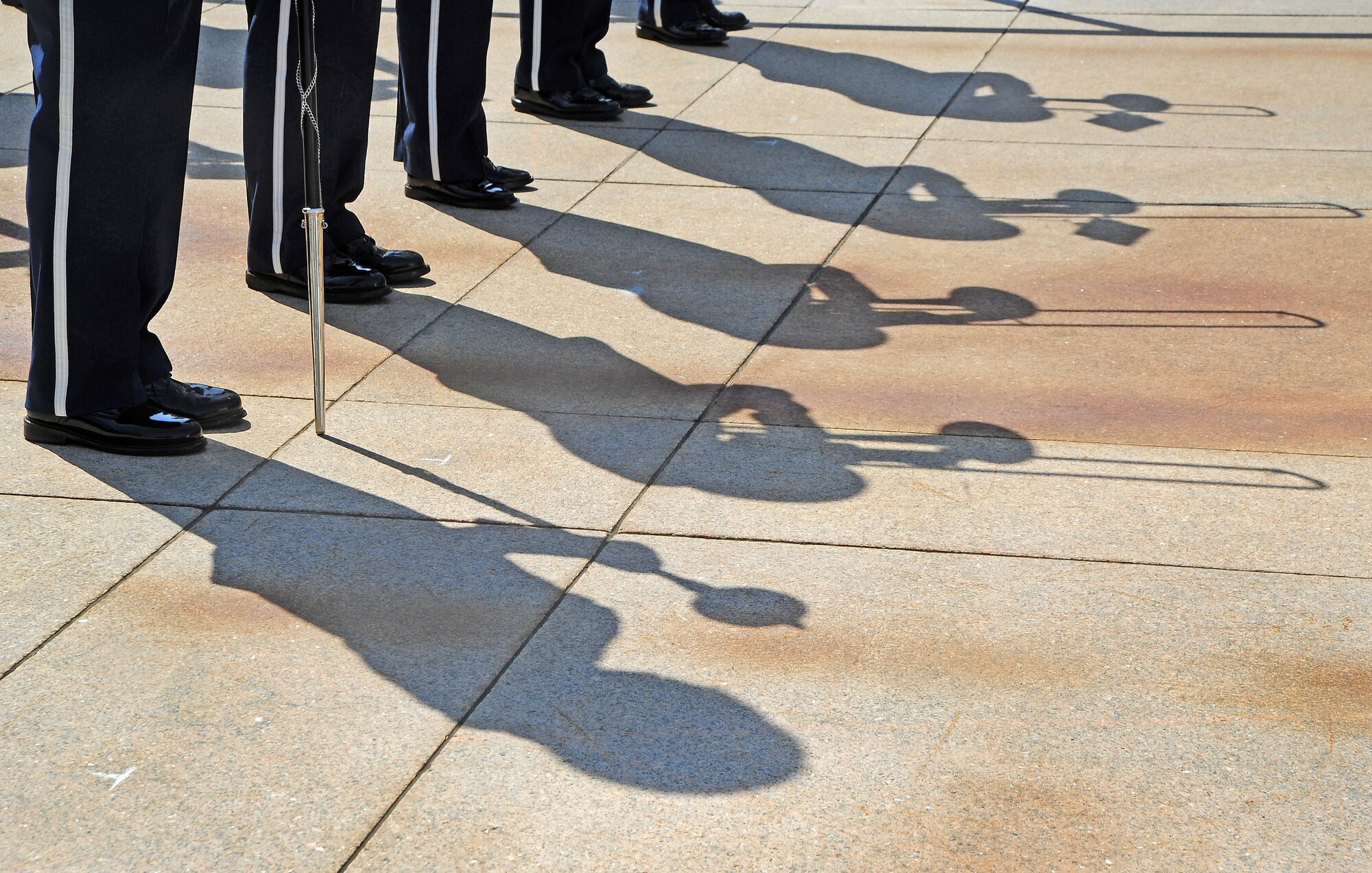 The U.S. Air Force Band Ceremonial Brass Ensemble performs during a wreath laying ceremony honoring Airmen of the Columbian Air Force at the Tomb of the Unknown Soldier, April 9, 2013, in Arlington, Va. The ceremonial brass ensemble is a 38-member organization consisting of world-class brass players, percussionists and a drum major. (U.S. Air Force photo by Senior Airman Steele C. G. Britton)