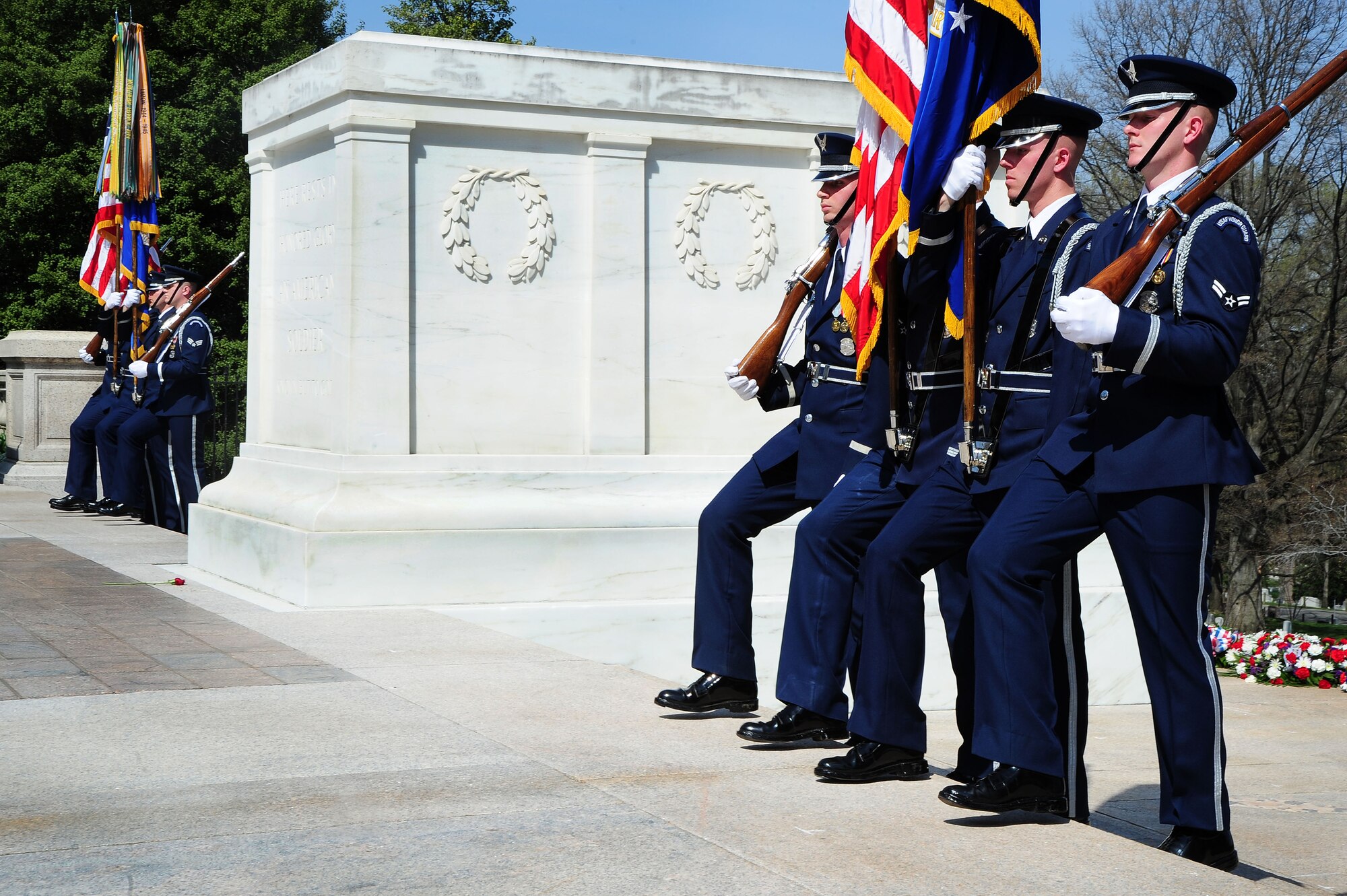 U.S. Air Force Honor Guard colors team members perform ceremonial drill during a wreath laying ceremony at the Tomb of the Unknown Soldier, April 9, 2013, in Arlington, Va. Air Force District of Washington Commander Maj. Gen. Sharon K. G. Dunbar hosted the ceremony. (U.S. Air Force photo by senior Airman Steele C. G. Britton)