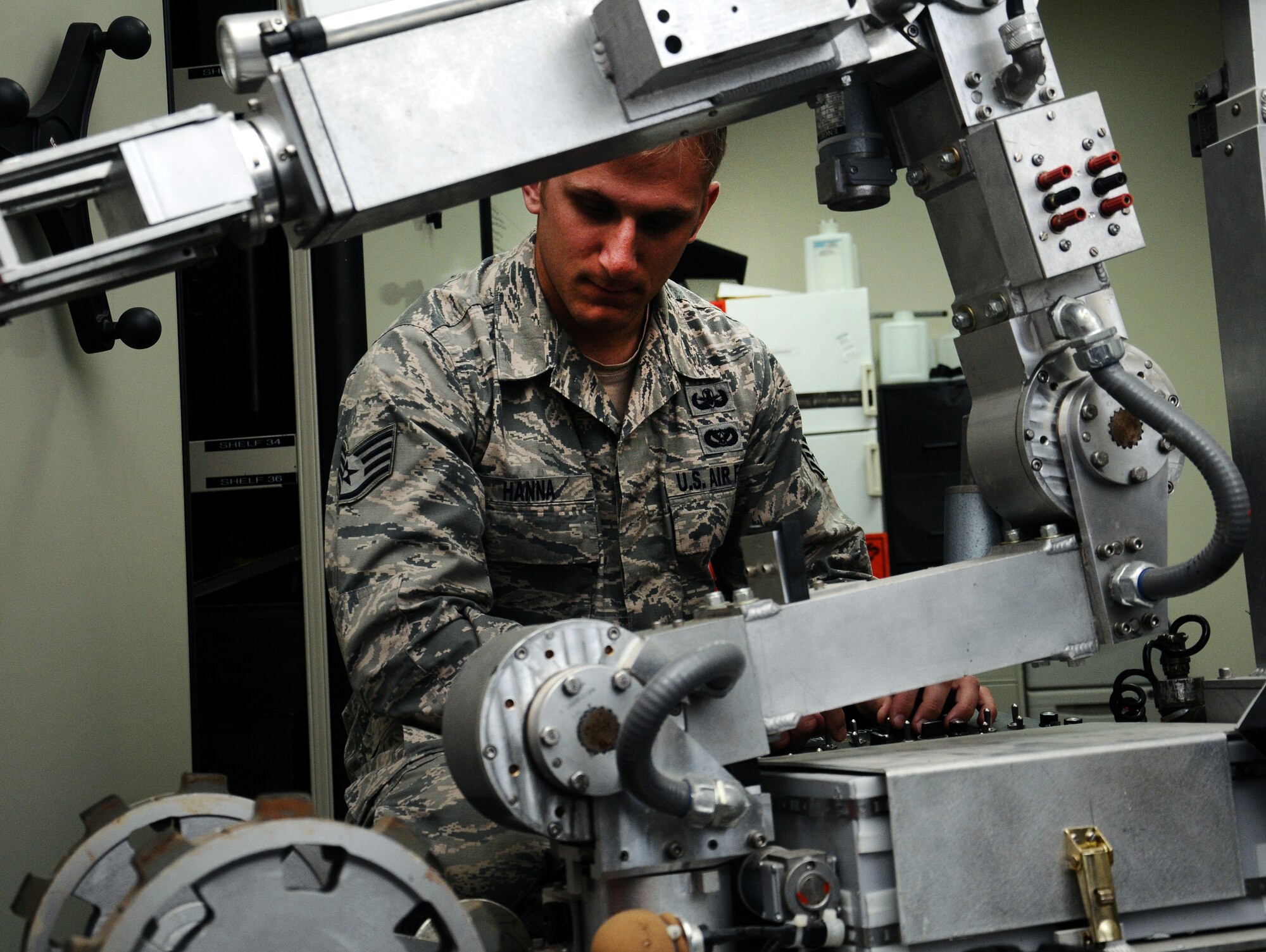 Staff Sgt. Joshua Hanna, 36th Civil Engineer Squadron explosive ordnance disposal journeyman, changes the battery on a F6A EOD robot on Andersen Air Force Base, Guam, April 11, 2013. Hanna was selected as the Pacific Air Forces’ 2012 Outstanding Airman of the Year in the Airman category for his superior performance while deployed and at home station. (U.S. Air Force photo by Airman 1st Class Mariah Haddenham/Released)