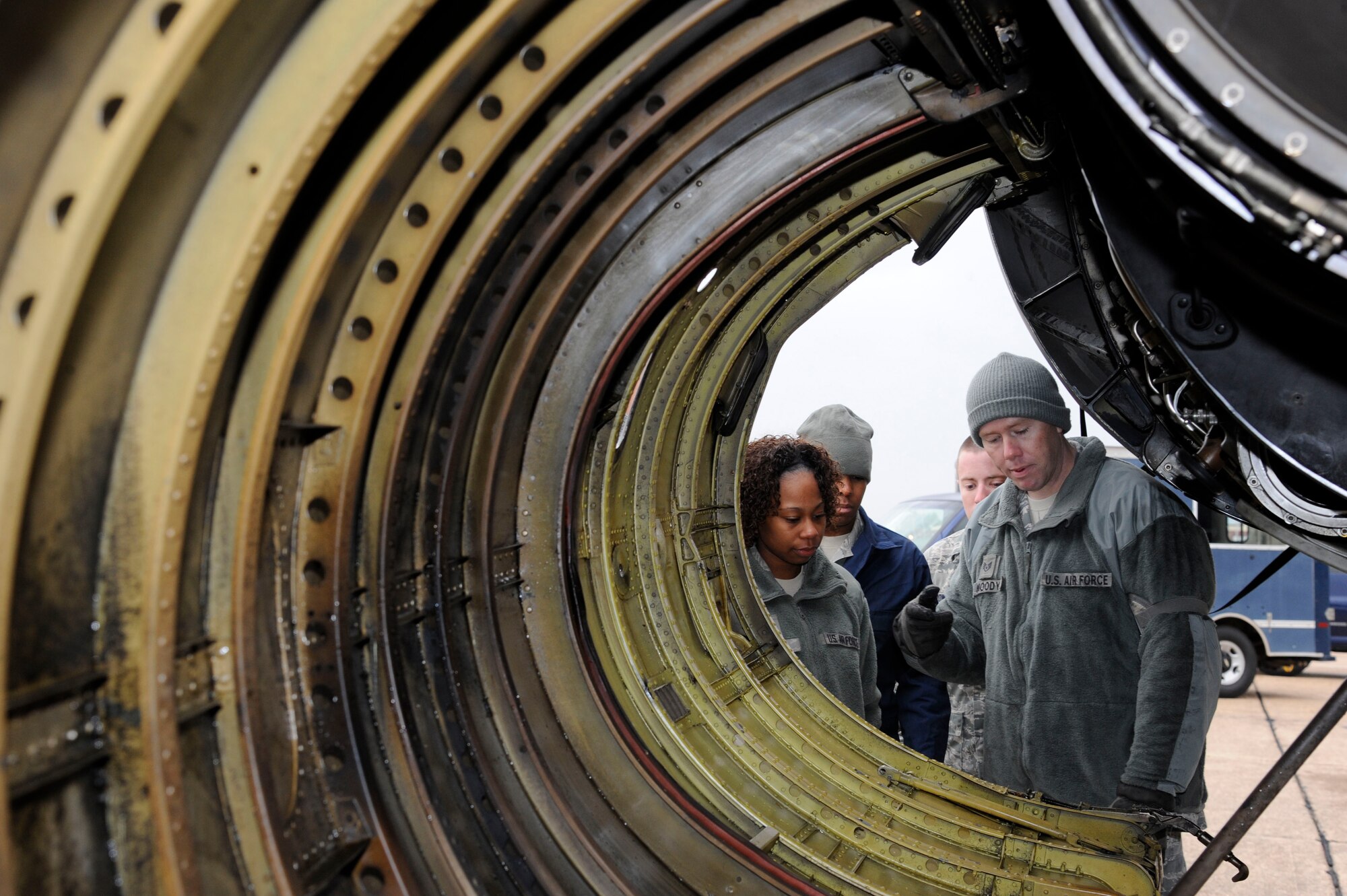 Staff Sgt. Richard Moody, 372nd Training Squadron Detachment B-52H Stratofortress Crew Chief instructor, instructs his field training detachment class on the proper way to detach B-52 engine cowlings on Barksdale Air Force Base, La., April 11, 2013. FTD is a six-week course designed to instruct new Airmen from technical school, or Airmen new to the airframe, more detailed aspects of their job, whether they are hydraulics, crew chiefs, or aerospace ground equipment. (U.S. Air Force photo/Airman 1st Class Andrew Moua)