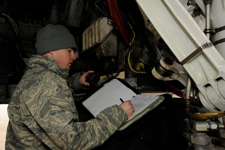 Tech. Sgt. Mark Hughes, 372nd Training Squadron Detachment 5 B-52H Stratofortress Hydraulics Instructor, documents forms before instructing his field training detachment class on performing a bomb bay door operations check on Barksdale Air Force Base, La., April 11, 2013. Hughes must document and report all tasks and discrepancies during the bomb bay door operations check. (U.S. Air Force photo/Airman 1st Class Andrew Moua)