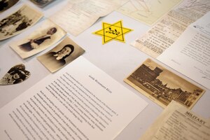 Pictures, postcards and personal information belonging to Gerda Weissmann Klein, a Holocaust victim, are displayed during the Holocaust Days of Remembrance Commemoration at Langley Air Force Base, Va., April 8, 2013. A local teacher whose family members who were victims of the Holocaust provided her personal collection of family memorabilia to be displayed during the commemoration. (U.S. Air Force photo by Senior Airman Brittany Paerschke-O’Brien/Released)