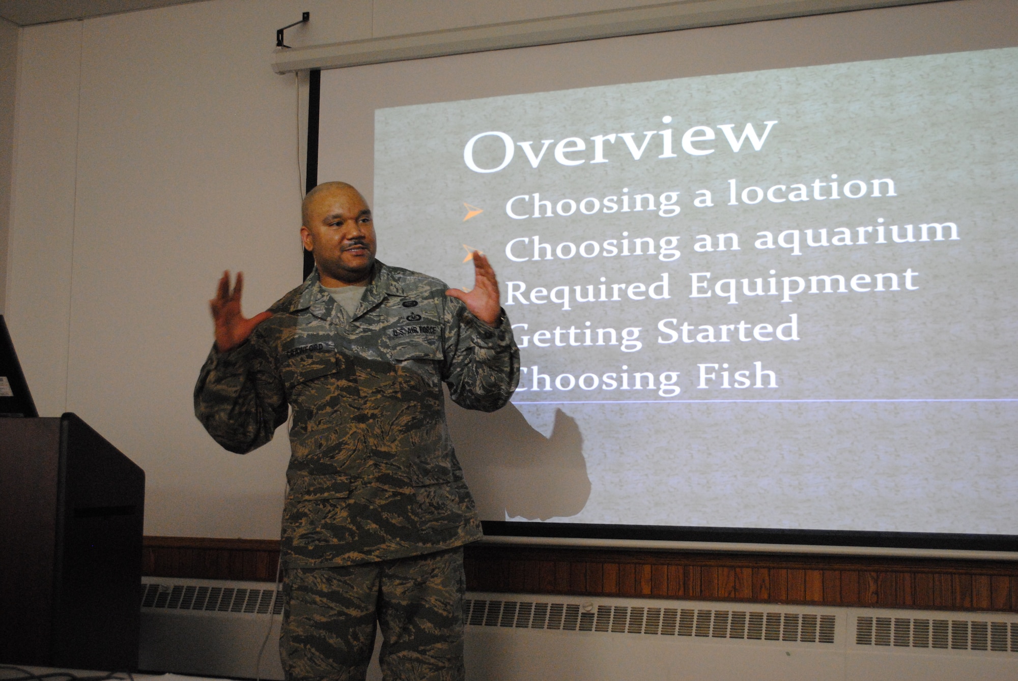 Staff Sgt. Larail Crawford concludes his presentation on setting up an aquarium April 8, 2013, at the 372nd Training Squadron, Detachment 27, on Grand Forks Air Force Base, N.D. Crawford was a student in a Principles of Instruction course, which is designed to teach students to be effective teachers themselves. (U.S. Air Force photo/Staff Sgt. Luis Loza Gutierrez)