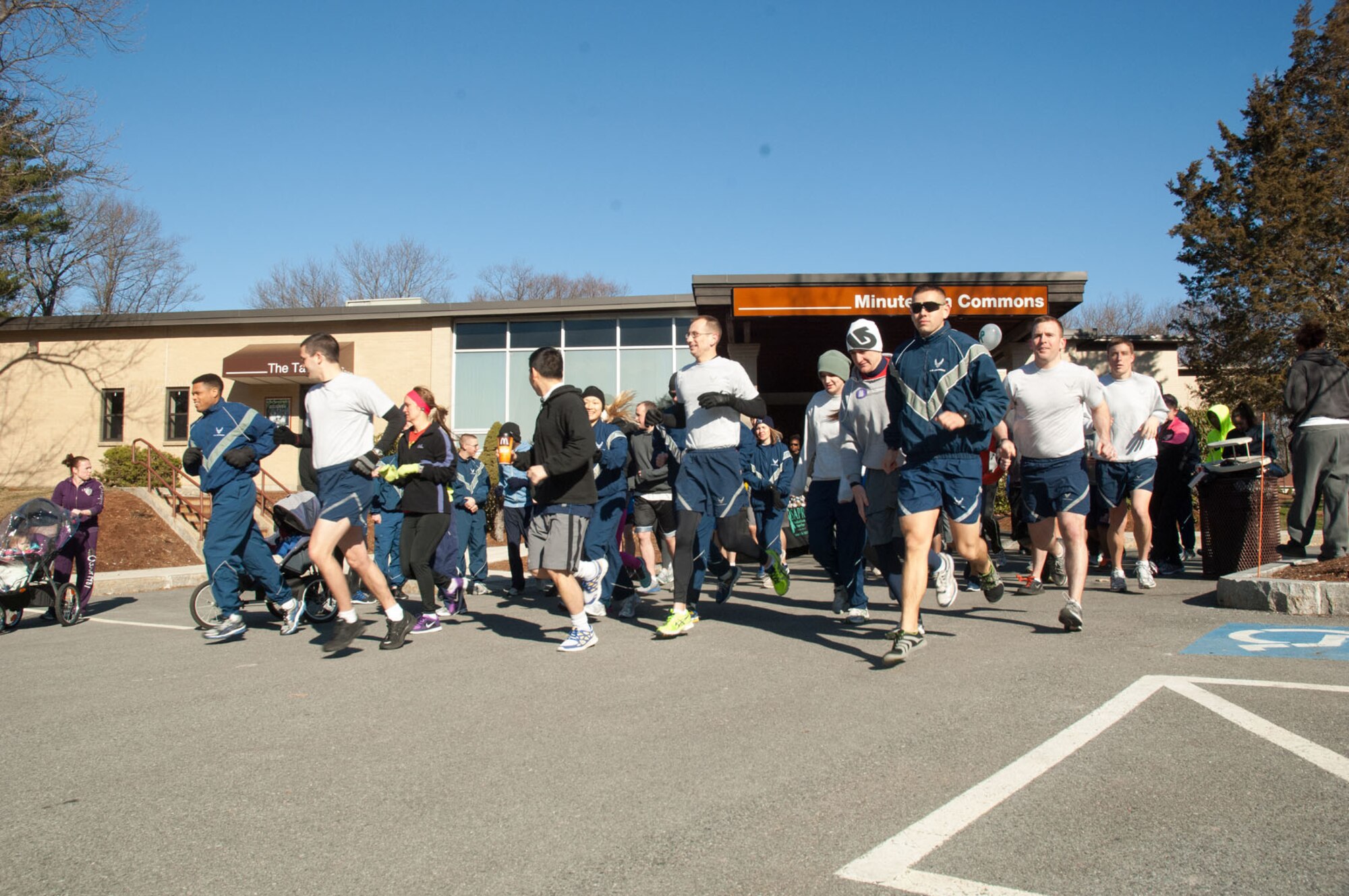 HANSCOM AIR FORCE BASE, Mass. - Runners get under way outside the Minuteman Commons for the Sexual Assault Awareness Month 5K April 3. The month of April is recognized as Sexual Assault Awareness Month and the race is one of many activities to keep sexual assault awareness and prevention in the forefront. (U.S. Air Force photo by Mark Herlihy)