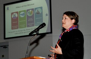 Karen Driscoll, Autism Speaks associate director for federal government relations and military affairs, gives a briefing on the challenges of Autism and some of the resources available to military families at Jacobs Theater at Fort Eustis, Va., April, 11, 2013. The briefing was one of many events held as part of the Month of the Military Child. (U.S. Air Force photo by Staff Sgt. Wesley Farnsworth/Released)