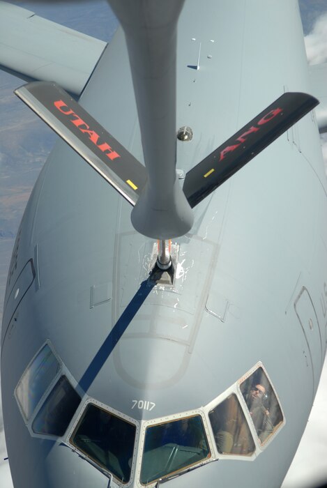 A KC-135 with the Utah Air National Guard 151st Air Refueling Wing refuels a KC-10 from Travis Air Force Base April 9, 2013.  (U.S. Air Force Photo by A1C Emily Hulse/Released)