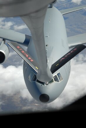 A KC-10 from Travis Air Force Base approaches a KC-135 with the Utah Air National Guard 151st Air Refueling Wing April 9, 2013.(U.S. Air Force Photo by A1C Emily Hulse/Released)
