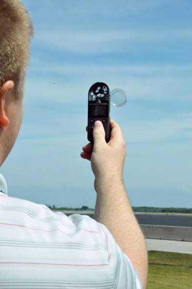 Mr. Jonathon George, 482nd Fighter Wing Weather Flight station chief, uses a Kestrel 4,000, or pocket weather tracker, near the flightline of Homestead Air Reserve Base, Fla., March 15. The Kestrel 4,000 measures wind speed, temperature, and air pressure. (U.S. Air Force photo/Senior Airman Jaimi Upthegrove)
