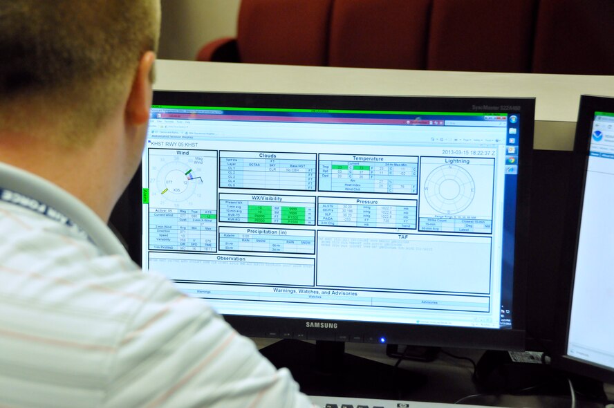 Mr. Jonathon George, 482nd Fighter Wing Weather Flight station chief, checks the Joint Environmental Toolkit website at Homestead Air Reserve Base, Fla., March 15. The weather flight uses this site and other DOD and dedicated civilian weather websites to supplement information gathered from their equipment to assist in putting weather reports together. (U.S. Air Force photo/Senior Airman Jaimi Upthegrove)