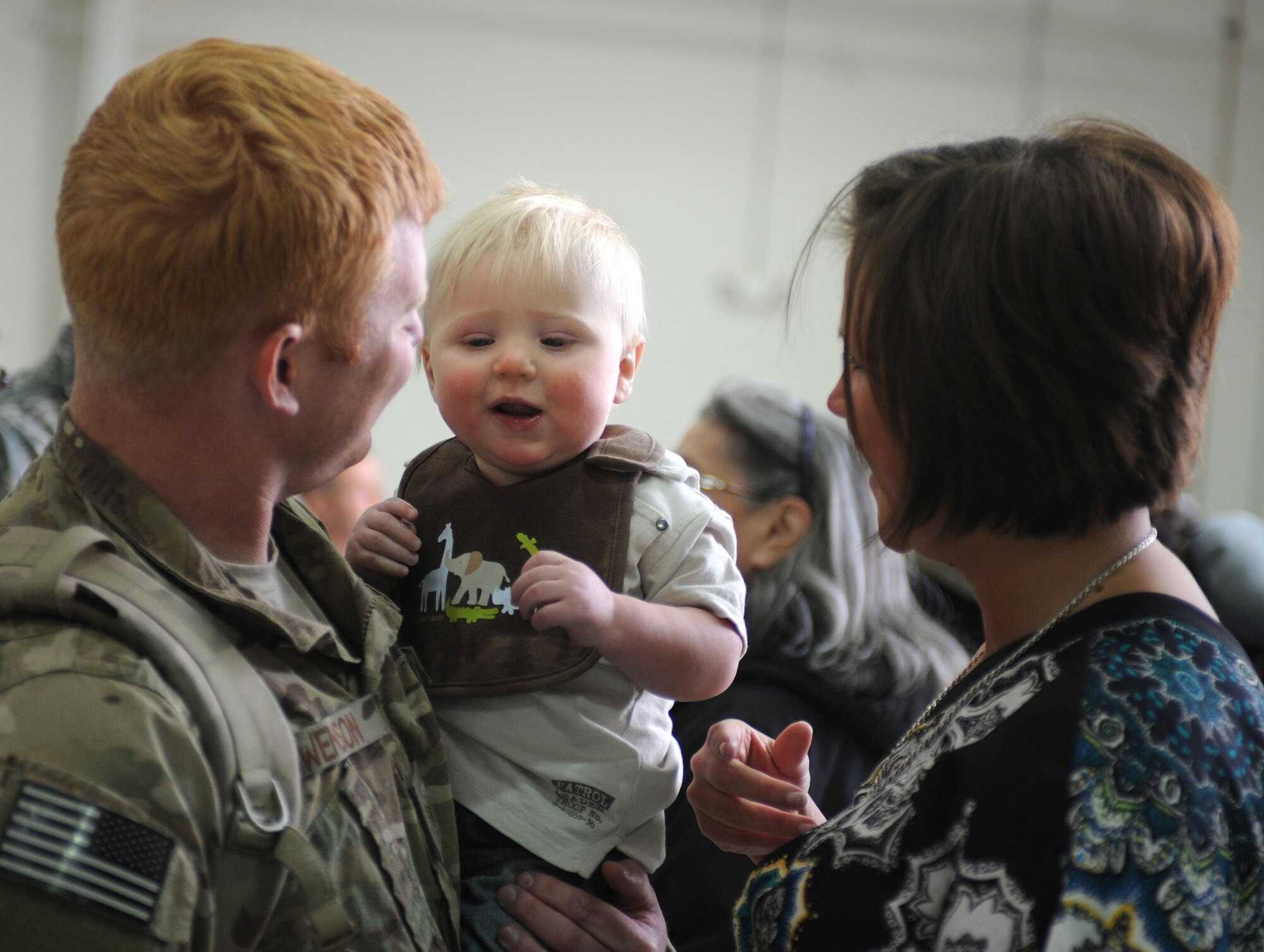 Air Commandos returning from deployment were welcomed home by 27th Special Operations Wing leadership, family members and friends during Operation Homecoming at Cannon Air Force Base, N.M., April 9, 2013. Operation Homecoming is a monthly event that reunites Cannon's Air Commandos with their loved ones. (U.S. Air Force photo/Airman 1st Class Ericka Engblom)