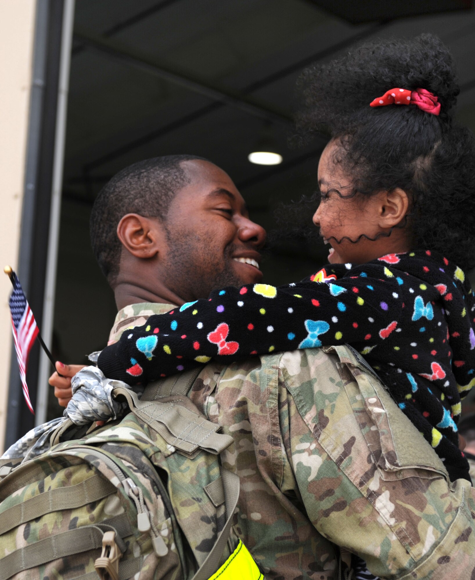 Air Commandos returning from deployment were welcomed home by 27th Special Operations Wing leadership, family members and friends during Operation Homecoming at Cannon Air Force Base, N.M., April 9, 2013. Operation Homecoming is a monthly event that reunites Cannon's Air Commandos with their loved ones. (U.S. Air Force photo/Airman 1st Class Ericka Engblom)