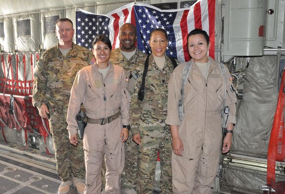 Master Sgt. John Kley, Capt. Adriana Valadez, Staff Sgt. Julian Williams, Lt. Col. Kathleen Sprague and Senior Airman Amanda Pena were the medical team on an Aeromedical Evacuation mission that transported a critically wounded combat controller from Mazar-e Sharif to Bagram Airfield, Afghanistan, on March 28, 2013. They are assigned to the 651st Expeditionary Aeromedical Evacuation Squadron at Kandahar Airfield. (U.S. Air Force photo/Capt. Tristan Hinderliter)