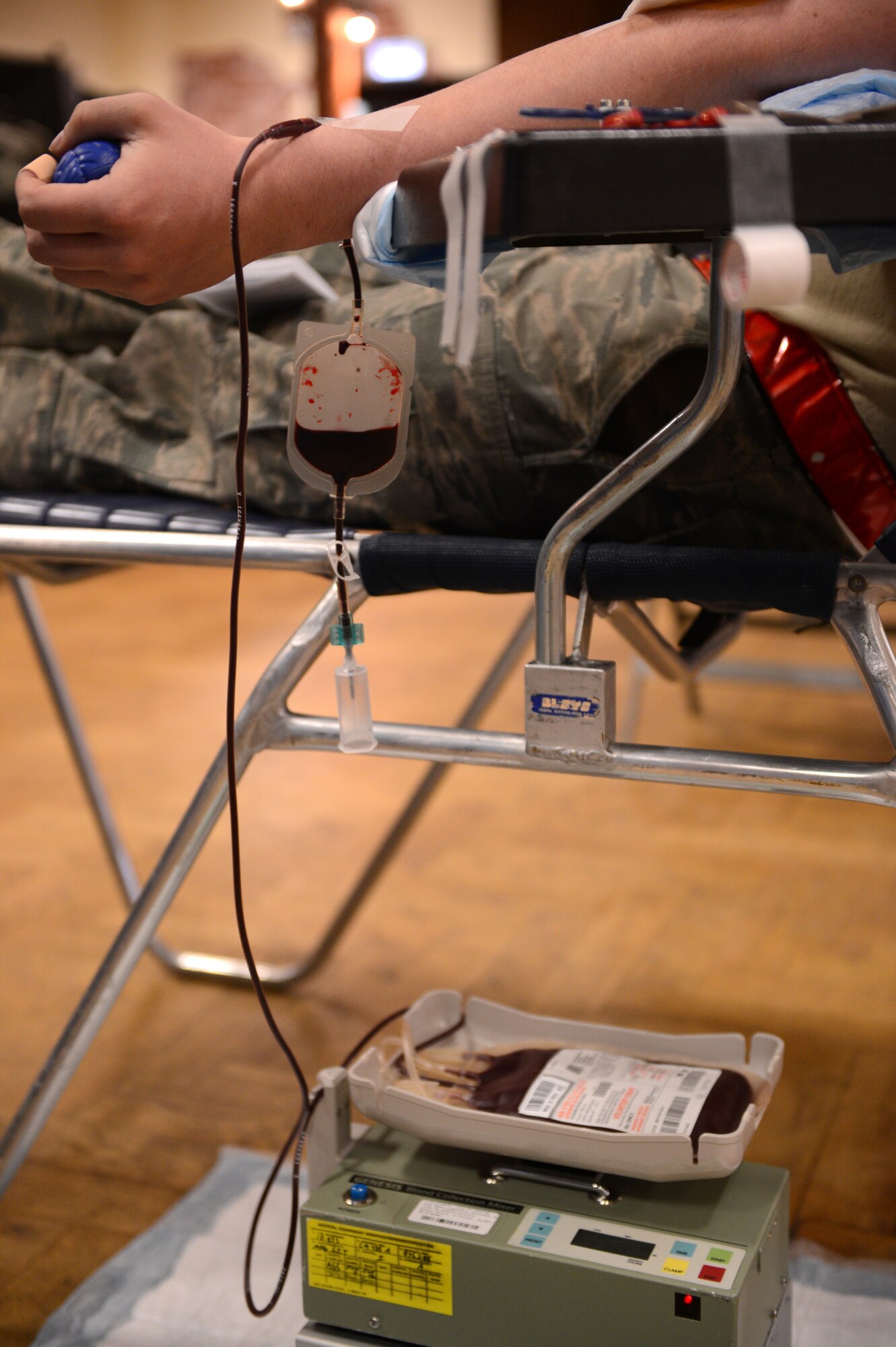 SPNAGDAHLEM AIR BASE, Germany – U.S. Air Force Senior Airman Patrick Clark, 52nd Aircraft Maintenance Squadron crew chief from Lawton, Okla., donates blood at the Brick House April 10, 2013. Each unit of blood can help save up to three people’s lives according to the Armed Services Blood Program. (U.S. Air Force photo by Airman 1st Class Kyle Gese/Released)