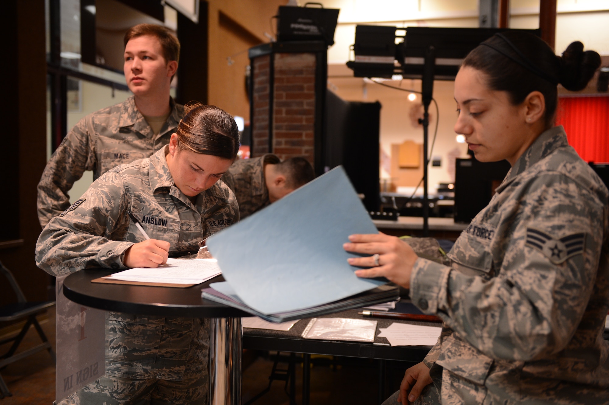SPANGDAHLEM AIR BASE, Germany – U.S. Air Force Airmen sign in to donate blood at the Brick House April 10, 2013. According to an Armed Services Blood Program official, Spangdahlem Air Base has the most volunteers that donate blood than in all of U.S. Air Forces in Europe. (U.S. Air Force photo by Airman 1st Class Kyle Gese/Released)