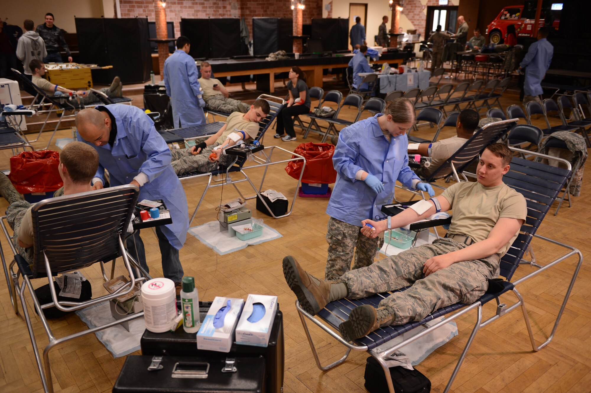 SPANGDAHLEM AIR BASE, Germany – U.S. Air Force Airmen give blood for the Armed Services Blood Program at the Brick House April 10, 2013. Blood collected from drives like this remain in the European region or is sent to deployed locations. (U.S. Air Force photo by Airman 1st Class Kyle Gese/Released)
