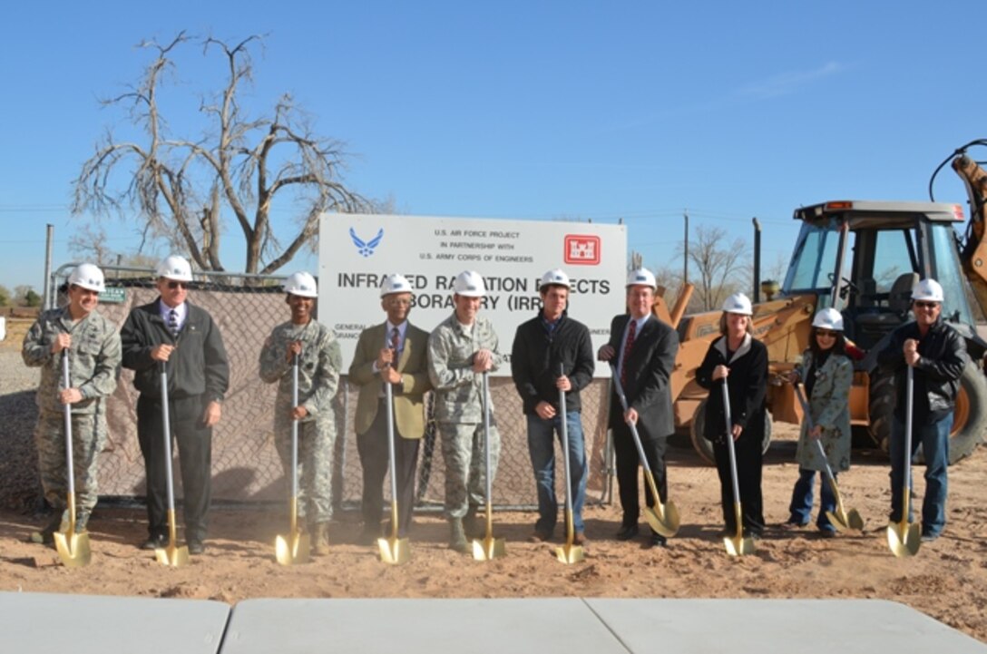 (L-R) Col. Bill Cooley, materiel wing director, Space Vehicles Directorate; Dr. Jim Riker, chief scientist, Space Vehicles Directorate; Lt. Col. Gant, commander, U.S. Army Corps of Engineers, Albuquerque District; Dr. B.K. “Babu” Singaraju, division chief, Space Vehicles Directorate; Capt. Dustin Guidry, deputy branch chief, Space Vehicles Directorate; Dr. Vincent Cowan, scientist, Space Vehicles Directorate;  Brent Wilson, base civil engineer; Susan Atwood, deputy director, Space Vehicles Directorate; Maria Cornay, president, GranCor Enterprises, Inc.; Mike Granjean, vice president, GranCor Enterprises, Inc., all participated in the groundbreaking for the new Infrared Radiation Effects Laboratory on Kirtland Air Force Base. 