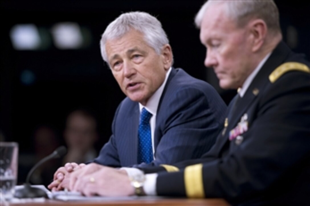 Secretary of Defense Chuck Hagel and Chairman of the Joint Chiefs of Staff Gen. Martin E. Dempsey brief the press on President Obama's budget request for the 2014 fiscal year as well as the continuing effects of sequestration on the defense budget in the Pentagon on April 10, 2013.  Hagel and Dempsey highlighted some of the changes in the way the department operates and reducing support costs to save an additional $34 billion over the next five years.  