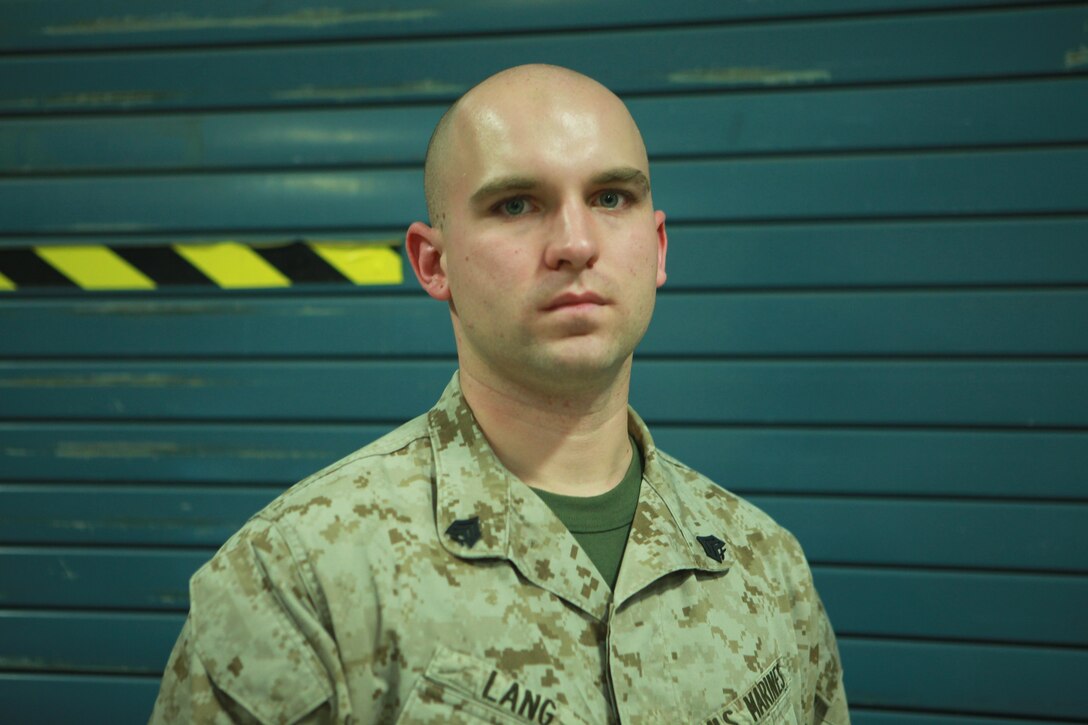 Sgt. Christian A. Lang, a mobile multi-channel radio operator with Data Platoon, Communications Company, Combat Logistics regiment 17, 1st Marine Logistics Group, recieved the Navy Comendation Medal for doing an excellent job in a Chief Warrent Officer's data chief billet. Lang, a native of Chelsea, Ala., also recieved the Herbert J. Littleton award, and award for excellence in communications as a noncommisioned officer. (U. S. Marine Corps photo by Lance Cpl. Cody Haas/Released)