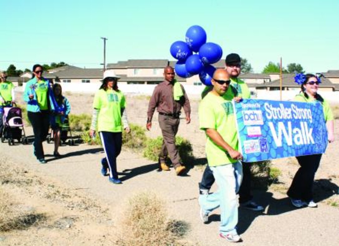 Residents and base employees participate during the Stroller Strong Walk hosted by the New Parent Support Program on Marine Corps Logistics Base Barstow, April 2. The three-mile stroller walk was the first of its kind to raise awareness for child abuse.


