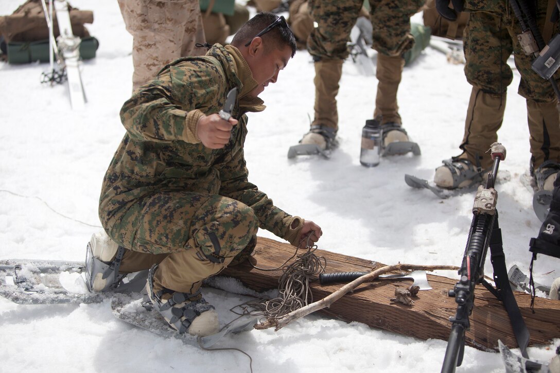 MOUNTAIN WARFARE TRAINING CENTER, BRIDGEPORT, Calif. - Sgt. Samnang Heng, a fire team leader with Combat Logistics Battalion 3, builds a fire during a basics for survival training course at Mountain Warfare Training Center in Bridgeport, Calif., April 5, 2013. (Lance Cpl. Suzanna Lapi)