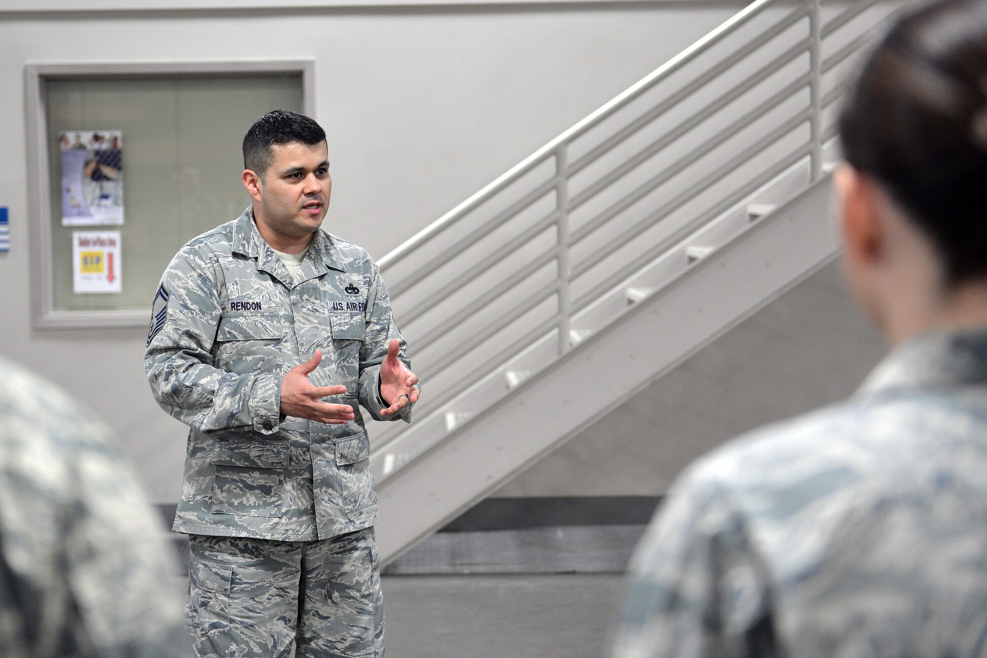Senior Master Sgt. Ernesto Rendon, 62nd Aerial Port Squadron air freight superintendent, briefs Airmen from the Air Freight Flight, April 12, 2013 at Joint Base Lewis-McChord, Wash. Rendon was named the Air Mobility Command Senior Non-commissioned Officer of the Year for 2012. (U.S. Air Force photo/Airman 1st Class Jacob Jimenez)