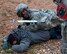 An exercise evaluation team member gives Airman 1st Class Jaron Harris, 7th Security Forces Squadron, feedback on checking bodies for explosives during Operational Readiness Exercise April 10, 2013, at Dyess Air Force Base, Texas. An ORE is one of many exercises designed to test a base’s ability to deploy quickly. The first two days of the exercise were conducted as a Phase I exercise and the last two as a Phase II exercise. In Phase II, Airmen traveled to Ray Rangel Air Base, Dyess’ mock deployment location, where Airmen were tested on their ability to function in a deployed environment. While at Ray Rangel, Airmen faced many challenges in the form of injects, which are scenarios that can vary from unexploded ordinances to opposition forces attacking the base. (U.S. Air Force photo by Airman 1st Class Damon Kasberg/ Released)