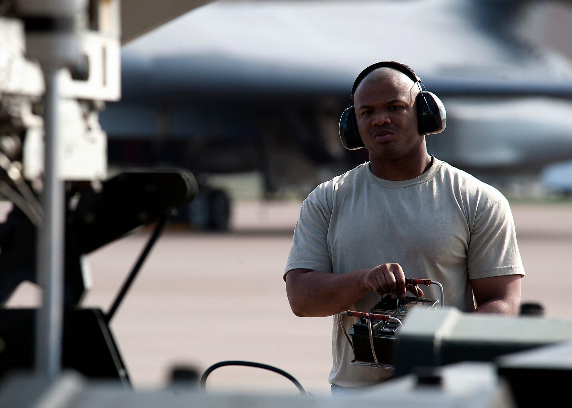 Senior Airman Kenneth Redmon, 7th Aircraft Maintenance Squadron, uses a portable control unit to remove a bomb module out of the forward weapons bay on a B-1 Bomber during an Operational Readiness Exercise April 8, 2013, at Dyess Air Force Base, Texas. An ORE is one of many exercises designed to test a base’s ability to deploy quickly. The first two days of the exercise were conducted as a Phase I exercise and the last two as a Phase II exercise. In Phase II, Airmen traveled to Ray Rangel Air Base, Dyess’ mock deployment location, where Airmen were tested on their ability to function in a deployed environment. While at Ray Rangel, Airmen faced many challenges in the form of injects, which are scenarios that can vary from unexploded ordinances to opposition forces attacking the base. (U.S. Air Force photo by Airman 1st Class Damon Kasberg/ Released)