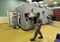 The high-altitude chamber conducts it “fini-flight” April 4 at Offutt Air Force Base, Neb.  The chamber, built using steel from WWII battleships, has been at Offutt for the past 56 years providing high-altitude training for flyers. (U.S. Air Force Photo by Josh Plueger/Released)