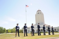 The ceremony, which was open to the JBSA community, included members from the Randolph Honor Guard for a 21-gun salute and a Band of the West bugler for the playing of “Taps.”  (U.S. Air Force photo by Melissa Peterson)