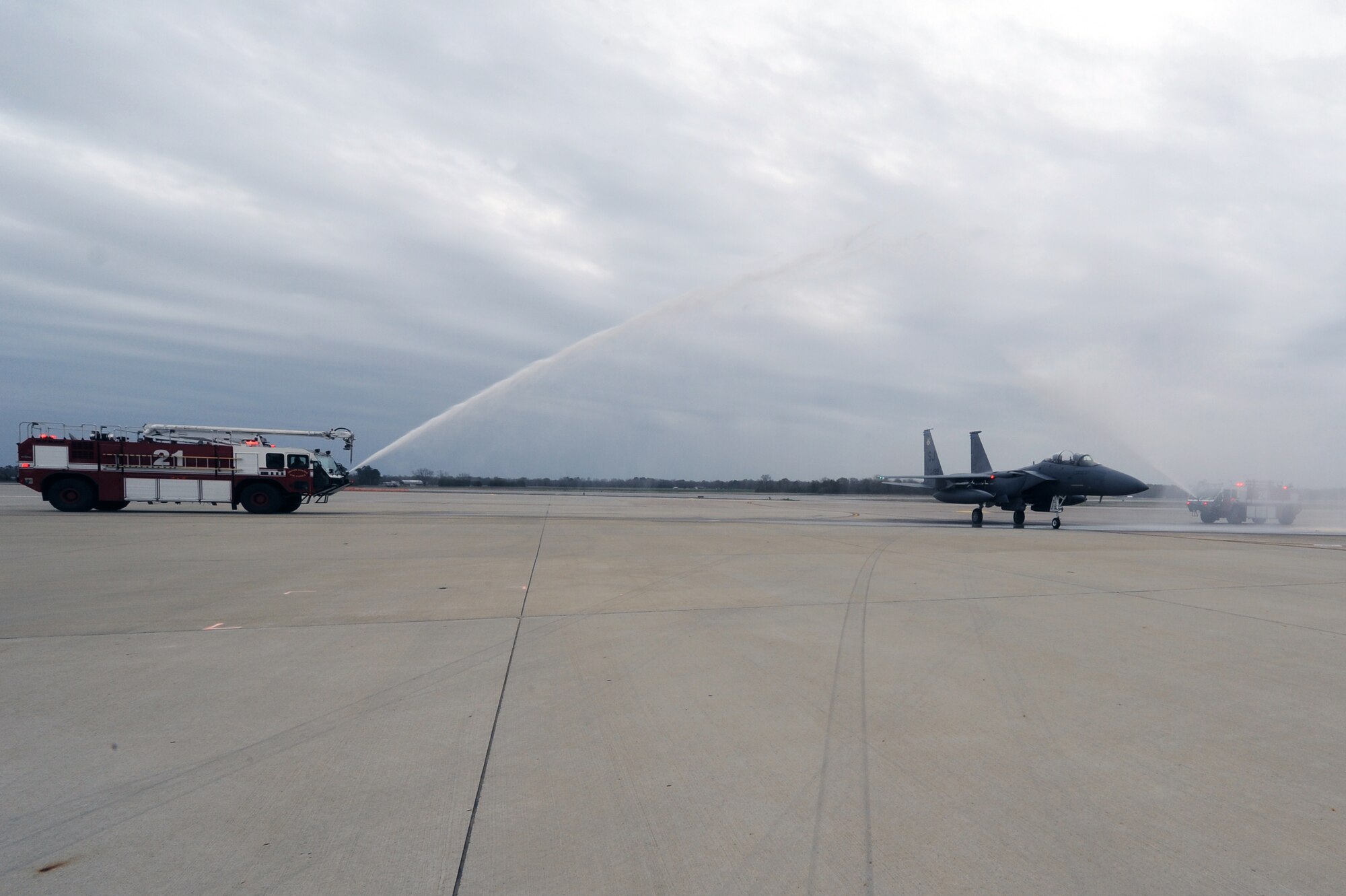 U.S. Air Force Col. Vann Green taxis under a water arc after completing his final flight as the 4th Fighter Wing vice commander on Seymour Johnson Air Force Base, N.C., April 4, 2013. Green will depart Seymour Johnson Air Force Base to become the Chief of Strategic Studies Group for the Chief of Staff of the Air Force. (U.S. Air Force photo by Airman 1st Class John Nieves Camacho/Released)