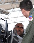 Lt. Col. James Washington, Chief of Operations and Flying Section, Headquarters Air Education and Training Command Inspector General, discusses a quality-of-instruction and safety flight he is about to fly with Capt. David Schunk, an instructor pilot with the 8th Flying Training Squadron at Vance Air Force Base, Okla. (U.S. Air Force photo/ Senior Airman Frank Casciotta)