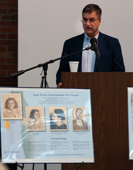 Dave Lerner addresses the audience during the F. E. Warren Air Force Base Holocaust remembrance event in the Fall Hall Community Center April 8. Lerner told the gathering about members of his family who were killed by the Nazis in concentration camps. His presentation included pictures of his relatives and artwork created by a young cousin. (U.S. Air Force photo by R.J. Oriez)