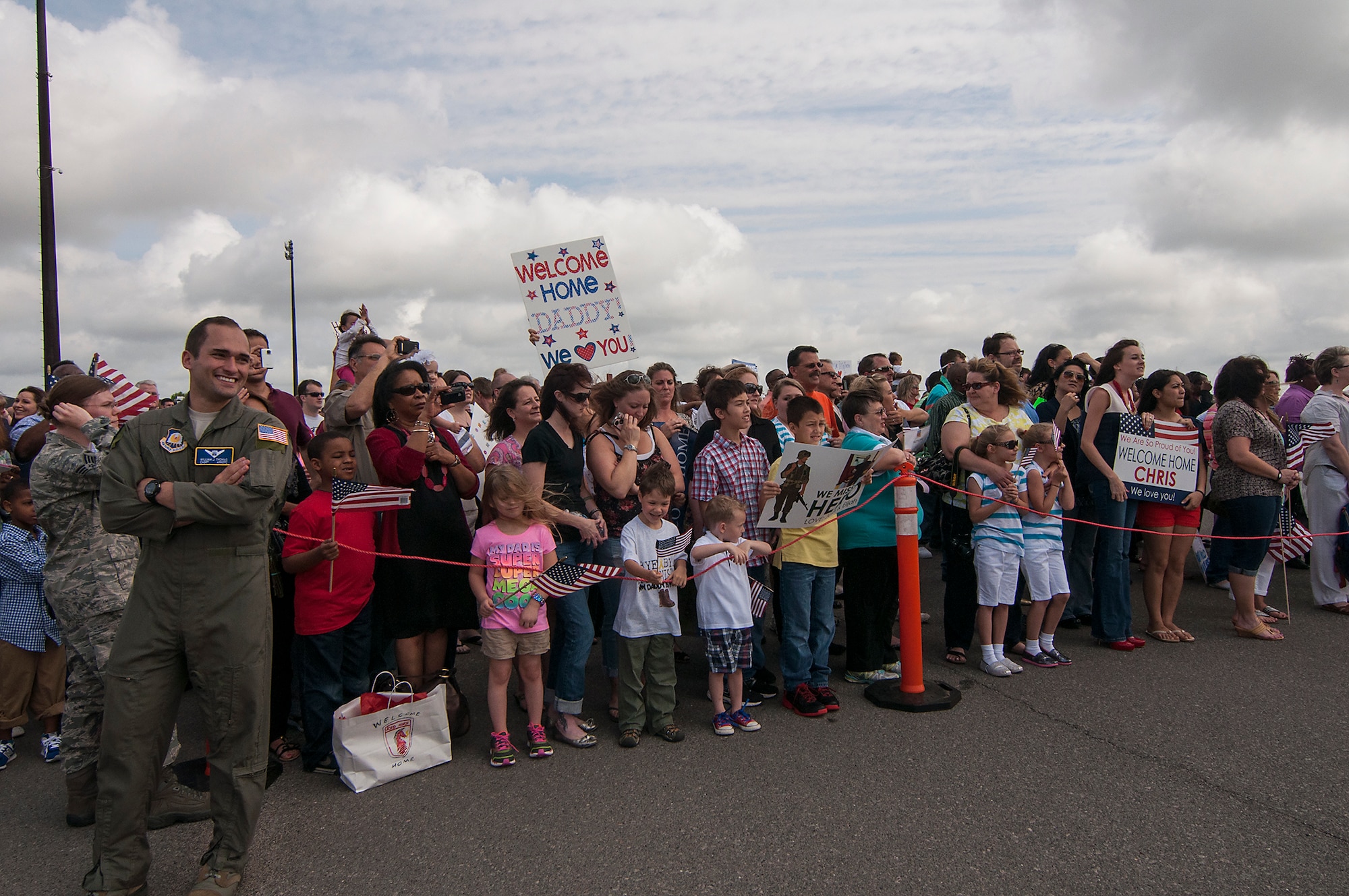 Hundreds of family members and friends waited anxiously in a packed Joint Base Charleston Passenger Terminal as a 747 charter jet carrying nearly 100 Airmen from 560th Red Horse Squadron returning from a six-month deployment April 11. (U.S. Air Force Reserve photo by Michael Dukes)