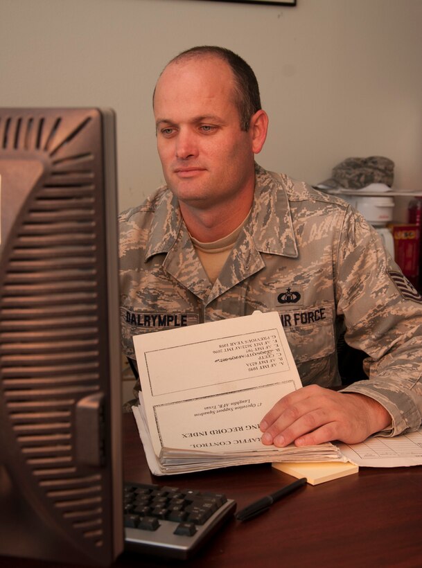 Tech. Sgt. Donald Dalrymple, 47th Operations Support Squadron NCO in charge of air traffic control training, reviews training documents at Laughlin Air Force Base, Texas, April 11, 2013. Dalrymple was named the best air traffic controller trainer in the Air Education Training Command for 2012. (U.S. Air Force photo/Airman 1st Class John D. Partlow)