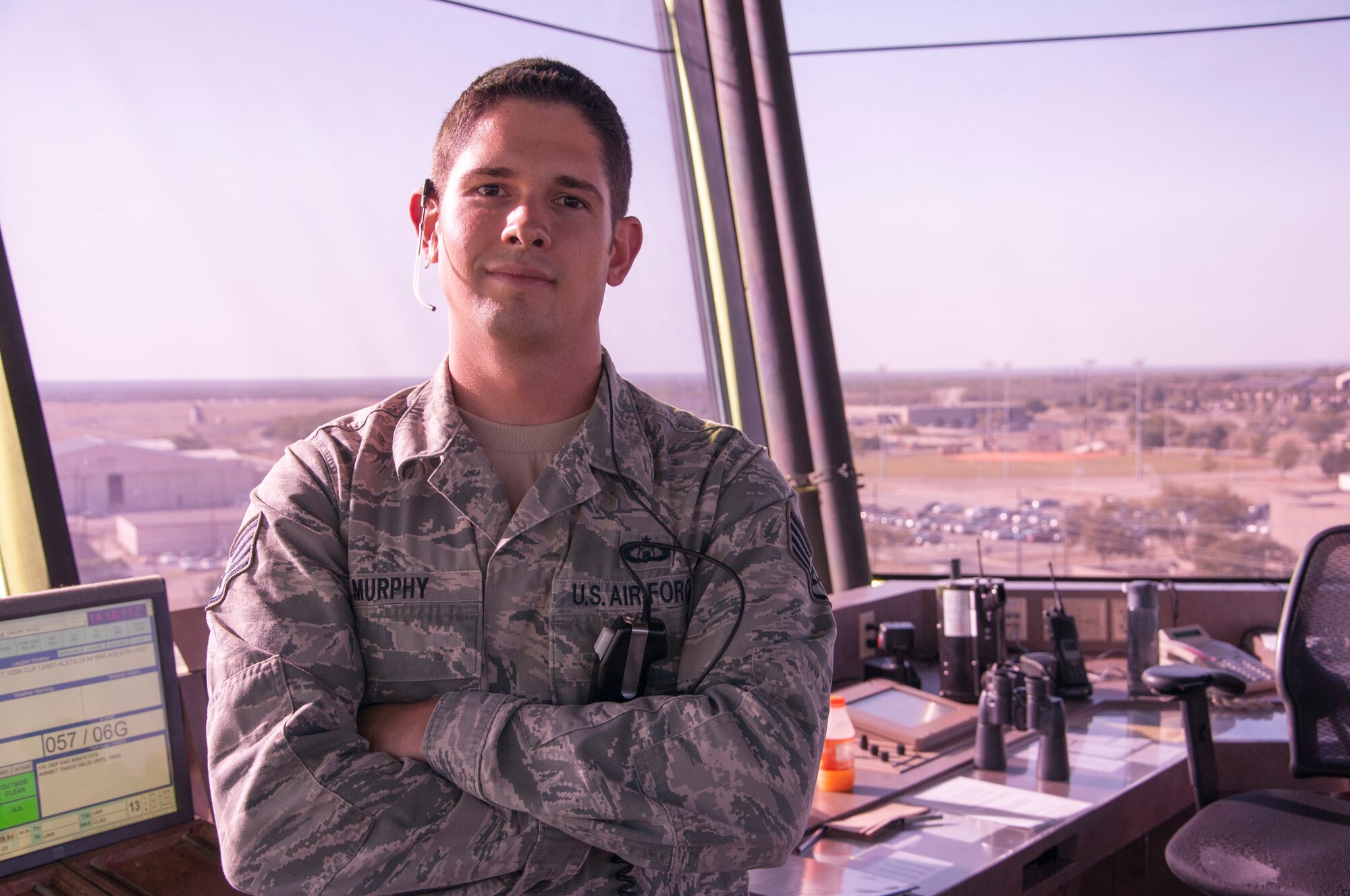 Staff Sgt. Benjamin Murphy, 47th Operations Support Squadron air traffic controller watch supervisor, poses for a photo in the control tower at Laughlin Air Force Base, Texas, April 11, 2013. Murphy was named the best ATC of the year in the Air Education Command for 2012. (U.S. Air Force photo/Airman 1st Class John D. Partlow)