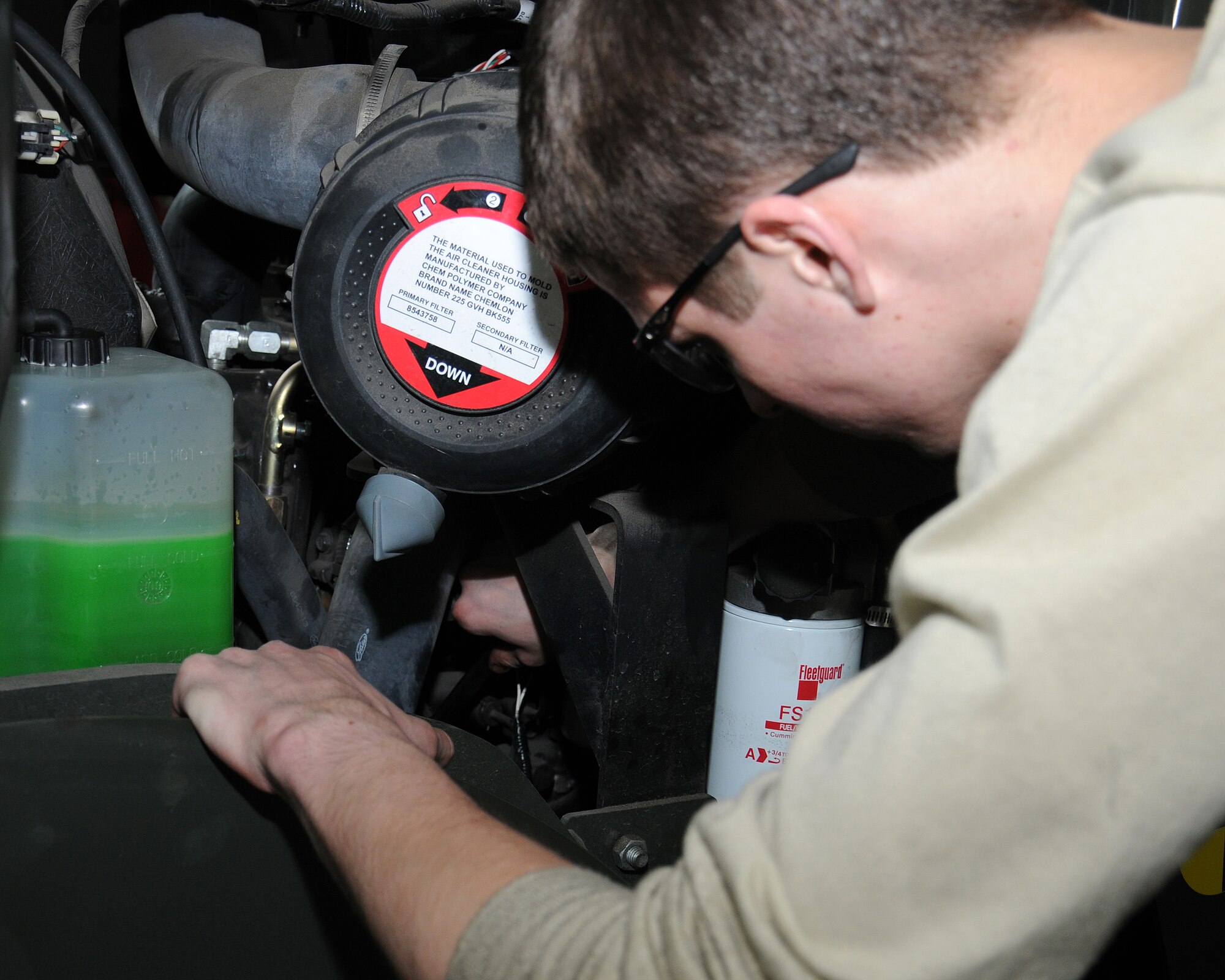 Airman 1st Class Kiley Greathouse, 100th Logistics Readiness Squadron special purpose vehicle maintenance apprentice from Fernandina Beach, Fla., troubleshoots a fuel system on a Hyster 10K forklift April 10, 2013, at RAF Mildenhall, England. Greathouse then bleeds the fuel system by cracking the lines open to make sure the forklift is ready for use. (U.S. Air Force photo by Gina Randall/Released)