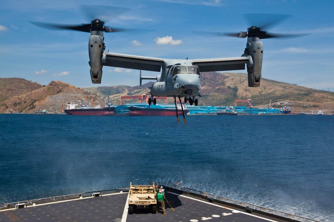 SUBIC BAY, Philippines – An MV-22B Osprey approaches the USNS Sacagawea to conduct an external lift of a high mobility multipurpose wheeled vehicle April 11 at Subic Bay, Republic of the Philippines, during exercise Freedom Banner 2013. This was the first time an Osprey has conducted an external lift with the Sacagawea. The aircraft is with Marine Medium Tiltrotor Squadron 265, Marine Aircraft Group 36, 1st Marine Aircraft Wing. (U.S. Marine Corps photo by Pfc. Kasey Peacock/Released)